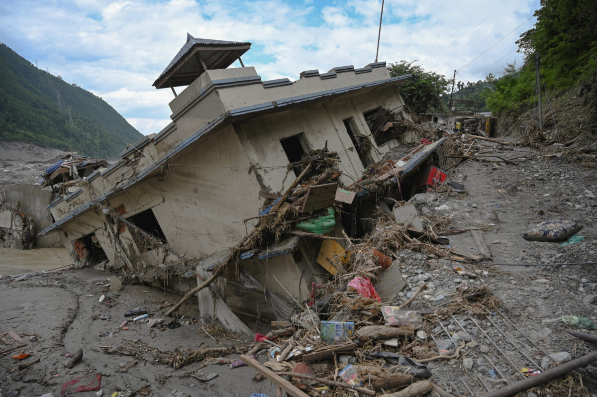Damaged buildings near Trishuli River following deadly flash floods and a mudslide, in Betrawati Bazaar in Rasuwa district, Nepal, August 30, 2026. REUTERS/Stringer