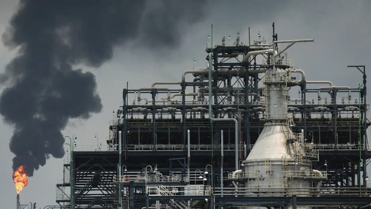 FILE PHOTO: A flame rises from a gas flare at the Dangote Industries oil refinery and fertilizer plant site in the Ibeju Lekki district of Lagos, Nigeria.