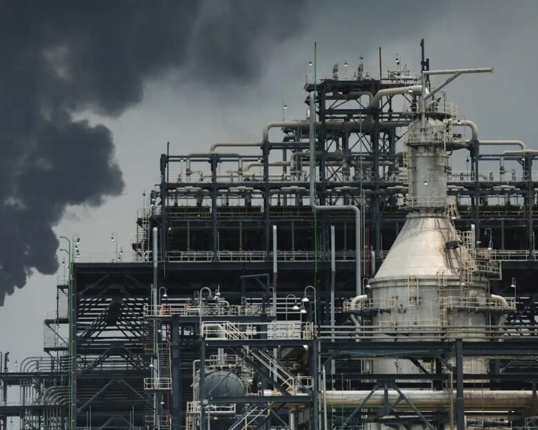 FILE PHOTO: A flame rises from a gas flare at the Dangote Industries oil refinery and fertilizer plant site in the Ibeju Lekki district of Lagos, Nigeria.