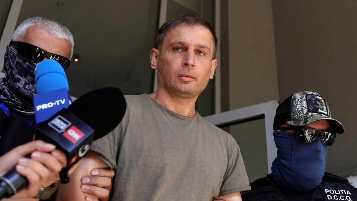 A Russian citizen believed to be involved in a thwarted sabotage operation coordinated by Russia on Romanian territory, according to Romania's SRI intelligence,is escorted outside the DIICOT (Romanian anti-organised crime prosecuting unit) headquarters, in Bucharest, Romania, September 8, 2026. Inquam Photos/Octav Ganea via REUTERS ATTENTION EDITORS - THIS IMAGE WAS PROVIDED BY A THIRD PARTY. ROMANIA OUT. NO COMMERCIAL OR EDITORIAL SALES IN ROMANIA