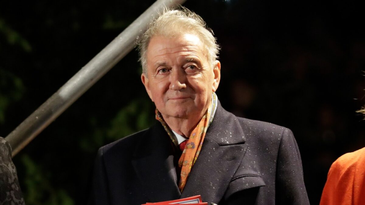 Terje Rod-Larsen, a Norwegian diplomat who was one of the main architects of the Oslo Accords signed 25 years ago, stands next to his wife the Norwegian Ambassador to Britain Mona Juul during the annual Norwegian Christmas tree lighting ceremony in Trafalgar Square, London, Thursday, Dec. 6, 2018. The Christmas tree is an annual gift from the city of Oslo to the people of Britain as a token of thanks for British support during their years of occupation in World War II. (AP Photo/Matt Dunham)