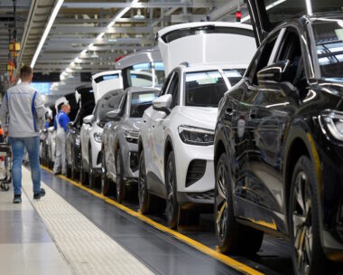FILE PHOTO: Technicians work at the production line for electric car models of the Volkswagen Group in Zwickau, Germany, April 26, 2022. REUTERS/Matthias Rietschel/File Photo