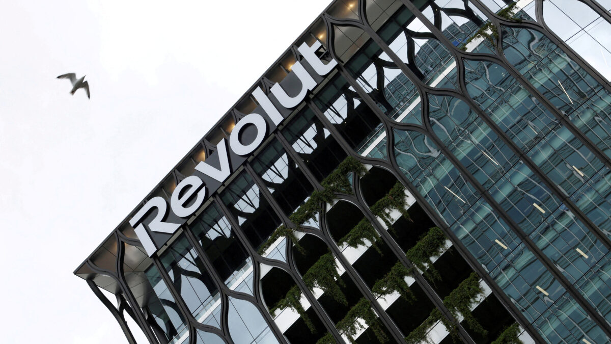 FILE PHOTO: A bird flies past the Revolut global headquarters in Canary Wharf, London, Britain, July 16, 2025.