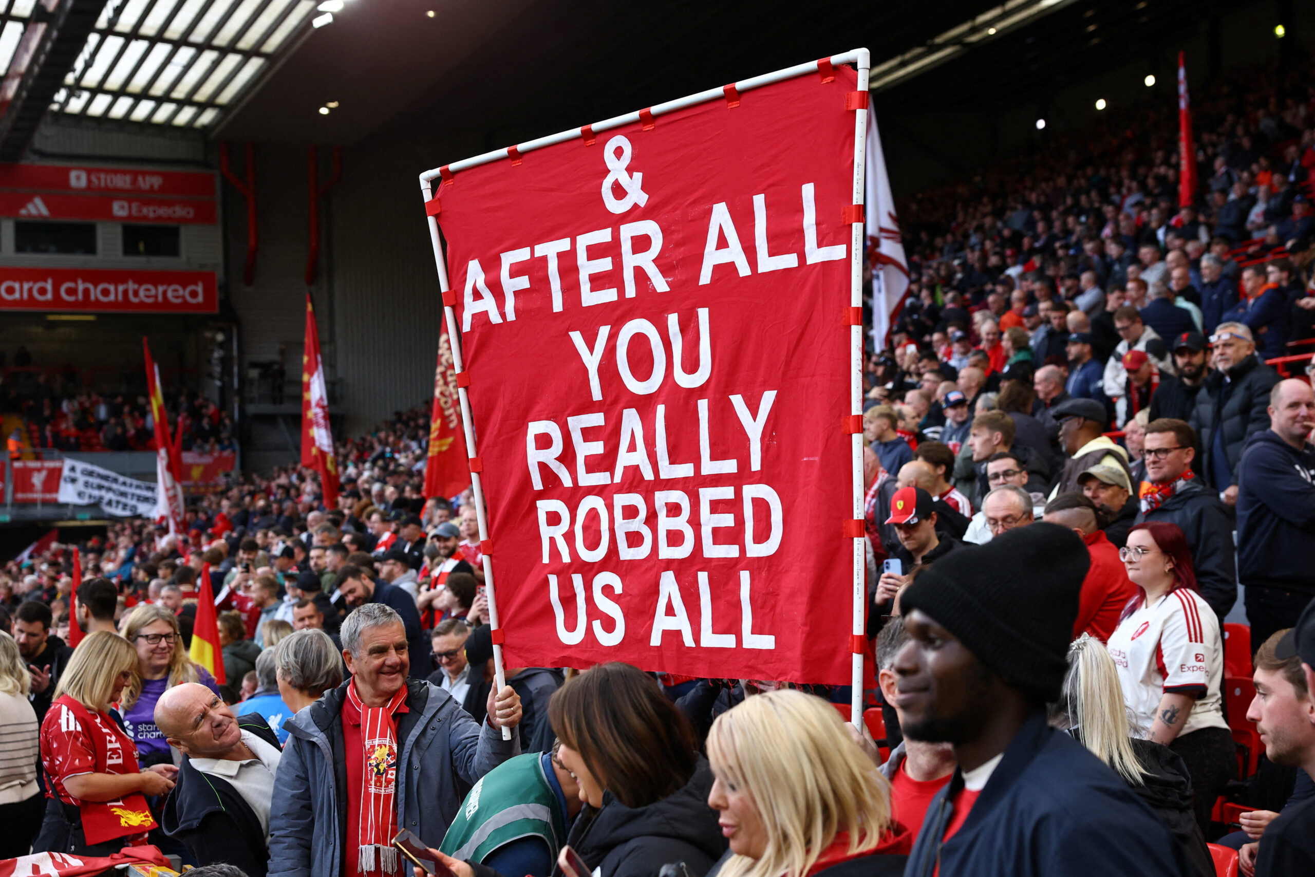 Premier League – Liverpool v Manchester City Soccer Football - Premier League - Liverpool v Manchester City - Anfield, Liverpool, Britain - October 11, 2026 Liverpool fans with a banner related to the Manchester City's Premier League charges inside the stadium before the match REUTERS/Phil Noble EDITORIAL USE ONLY. NO USE WITH UNAUTHORIZED AUDIO, VIDEO, DATA, FIXTURE LISTS, CLUB/LEAGUE LOGOS OR 'LIVE' SERVICES. ONLINE IN-MATCH USE LIMITED TO 120 IMAGES, NO VIDEO EMULATION. NO USE IN BETTING, GAMES OR SINGLE CLUB/LEAGUE/PLAYER PUBLICATIONS. PLEASE CONTACT YOUR ACCOUNT REPRESENTATIVE FOR FURTHER DETAILS.. TPX IMAGES OF THE DAY