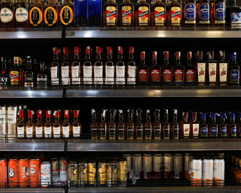 FILE PHOTO: Bottles of alcoholic beverages are displayed on shelves at a liquor store in Bengaluru, India, January 20, 2026.