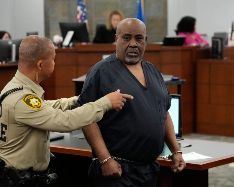 Duane Davis, right, arrives for a sentencing hearing after his murder conviction in the death of rapper Tupac Shakur on Tuesday, Oct. 13, 2026, in Las Vegas.