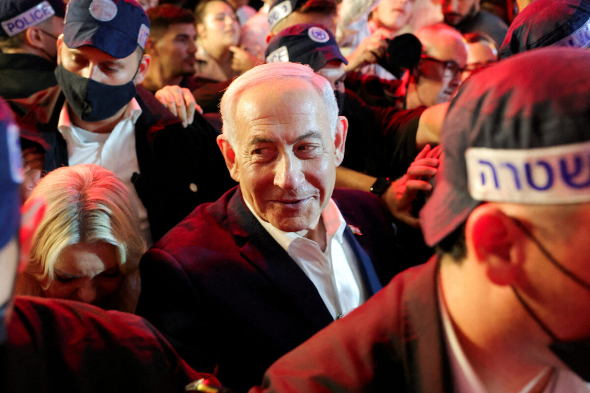 FILE PHOTO: Israeli Prime Minister Benjamin Netanyahu, leader of the Likud party, reacts as he tours the Mahane Yehuda market, ahead of Israel's national election, in Jerusalem, October 23, 2026. REUTERS