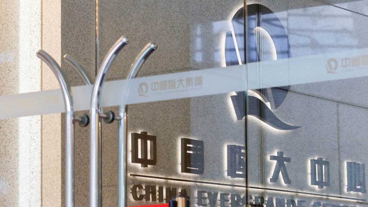 FILE PHOTO: The logo of China Evergrande is seen at China Evergrande Centre in Hong Kong, China December 7, 2021.
