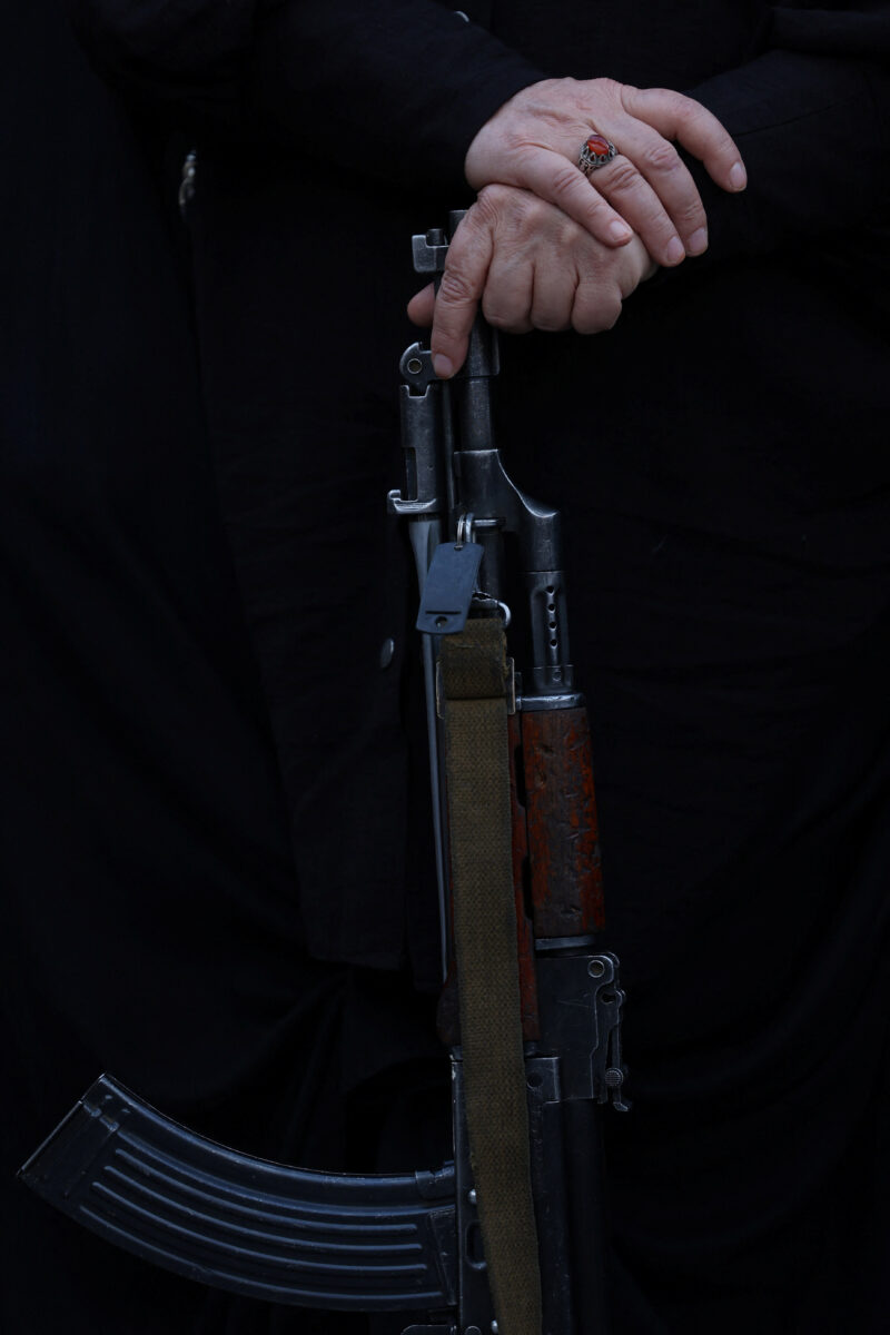 An Iranian woman volunteer holds a gun as she receives military training at a military training center for ordinary citizens at Imam Hussein Square in central Tehran, Iran, October 4, 2026. Majid Asgaripour