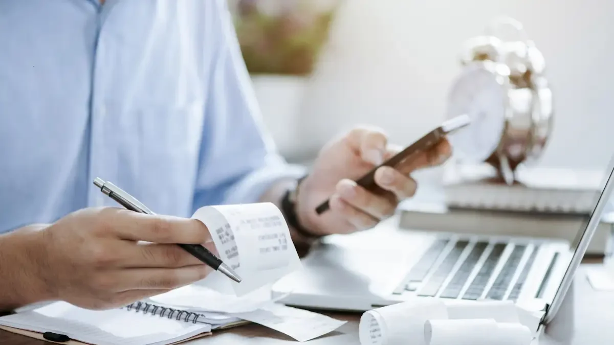 young man holding pen with bills working for calculate business data, taxes, bills payment, Start up counting finance. accounting, statistics, and analytic research concept