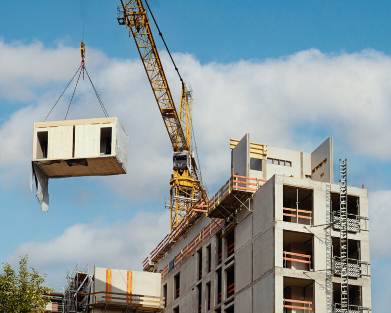 Construction site of an office building in Berlin. The new structure will be built in modular timber construction.