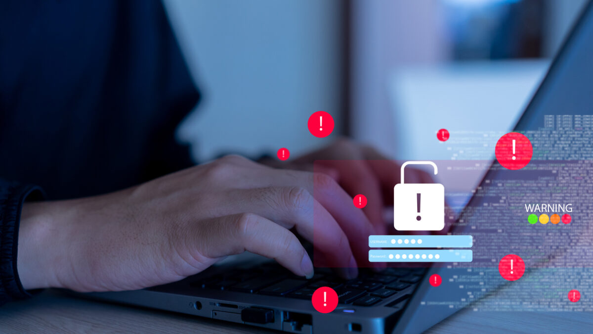 close up programmer man hand type on laptop to access on privacy account system to hacking or stealing data information in company with virtual icon cyberspace for crime of technology concept