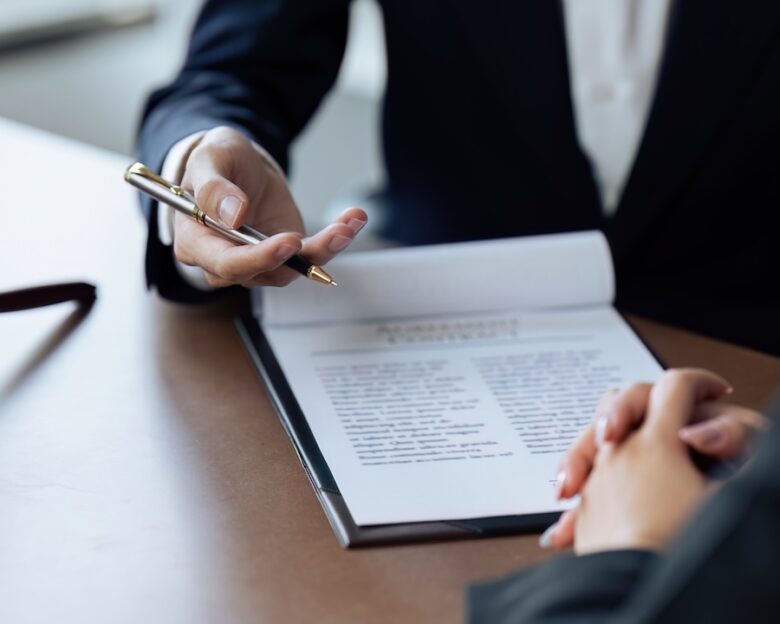 Lawyer, legal advisor, businessperson explaining agreement details Business contracts