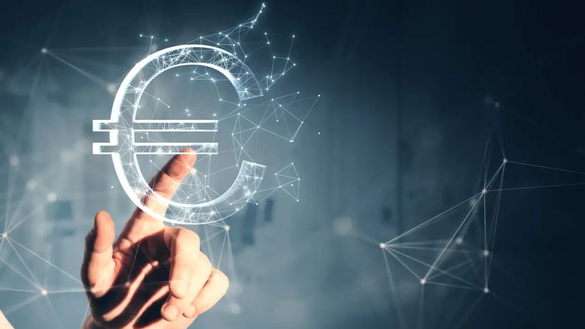 Close up of male hand pointing at creative polygonal euro sign on gray wall background. Online banking, money and trade concept