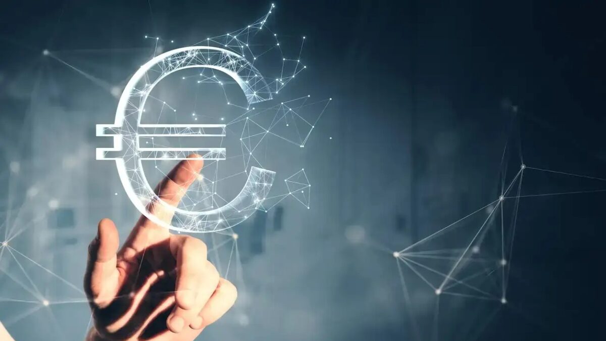 Close up of male hand pointing at creative polygonal euro sign on gray wall background. Online banking, money and trade concept