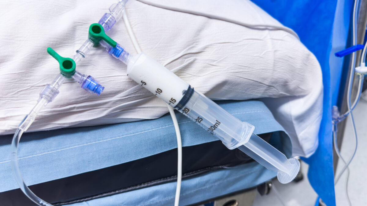 Medical vials, syringes, and needles representing hospital drugs and medications for anesthesia and sedation in healthcare settings