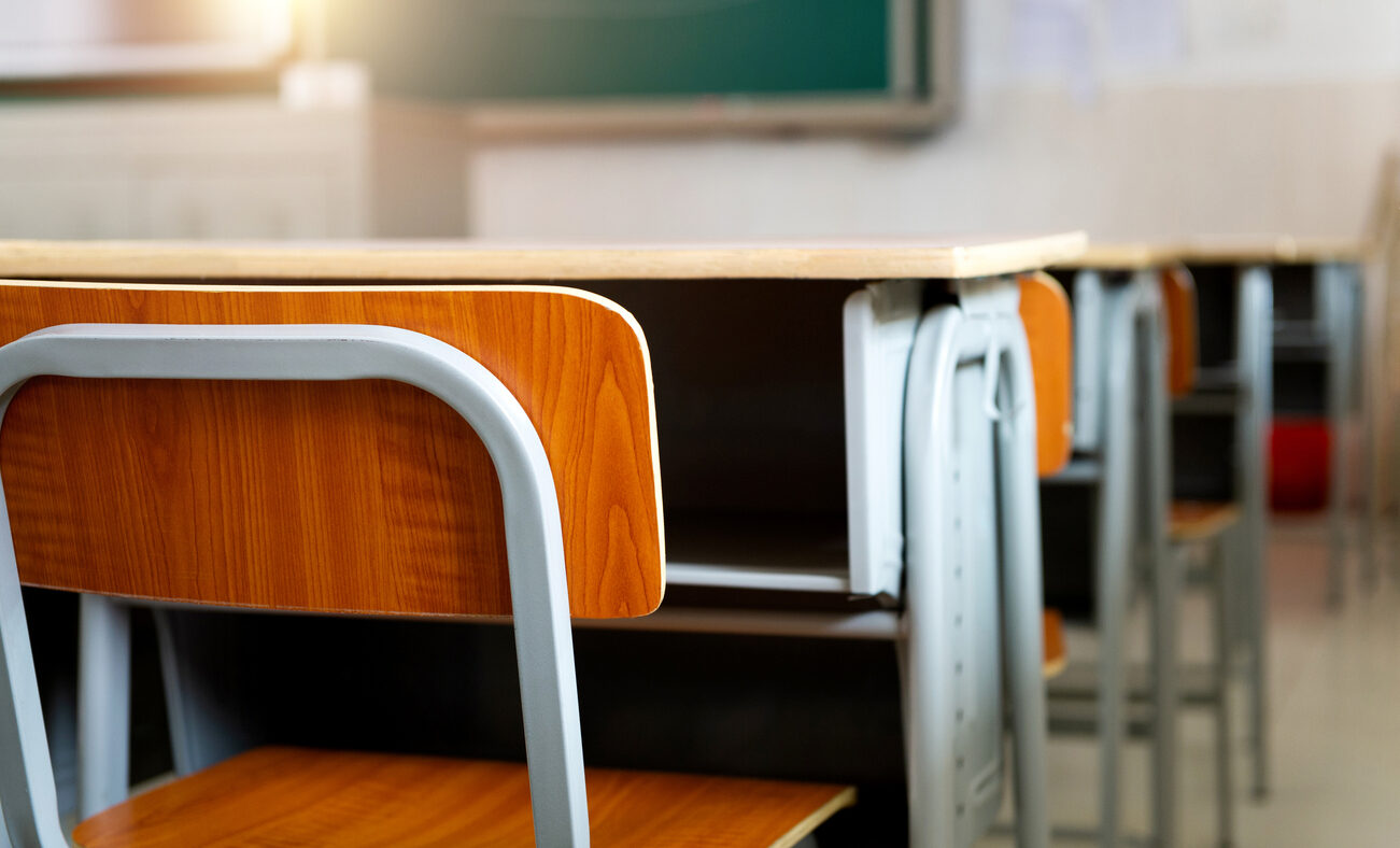 Empty classroom with chairs and desks
