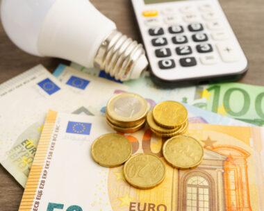 Cost of electric utilities with light bulb for payment.