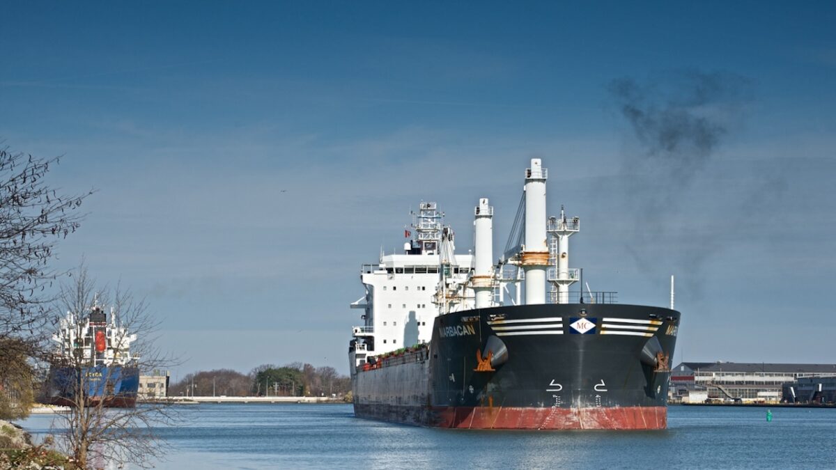 St. Catharines, Ontario, Canada - November 15, 2015: The Marbacan bulk carrier navigating south up the Welland Canal between Lock 1 and Lock 2, while the Polsteam Iryda waits to enter Lock 1 in the background
