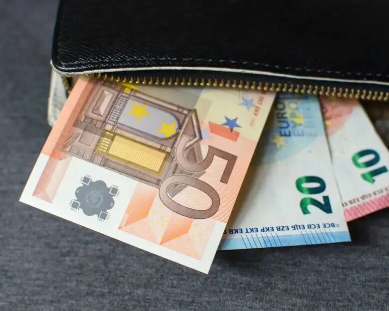 Black leather wallet with money euro
