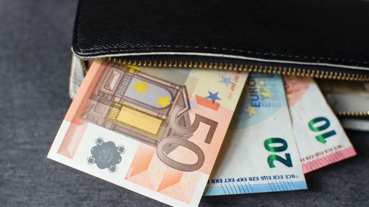 Black leather wallet with money euro