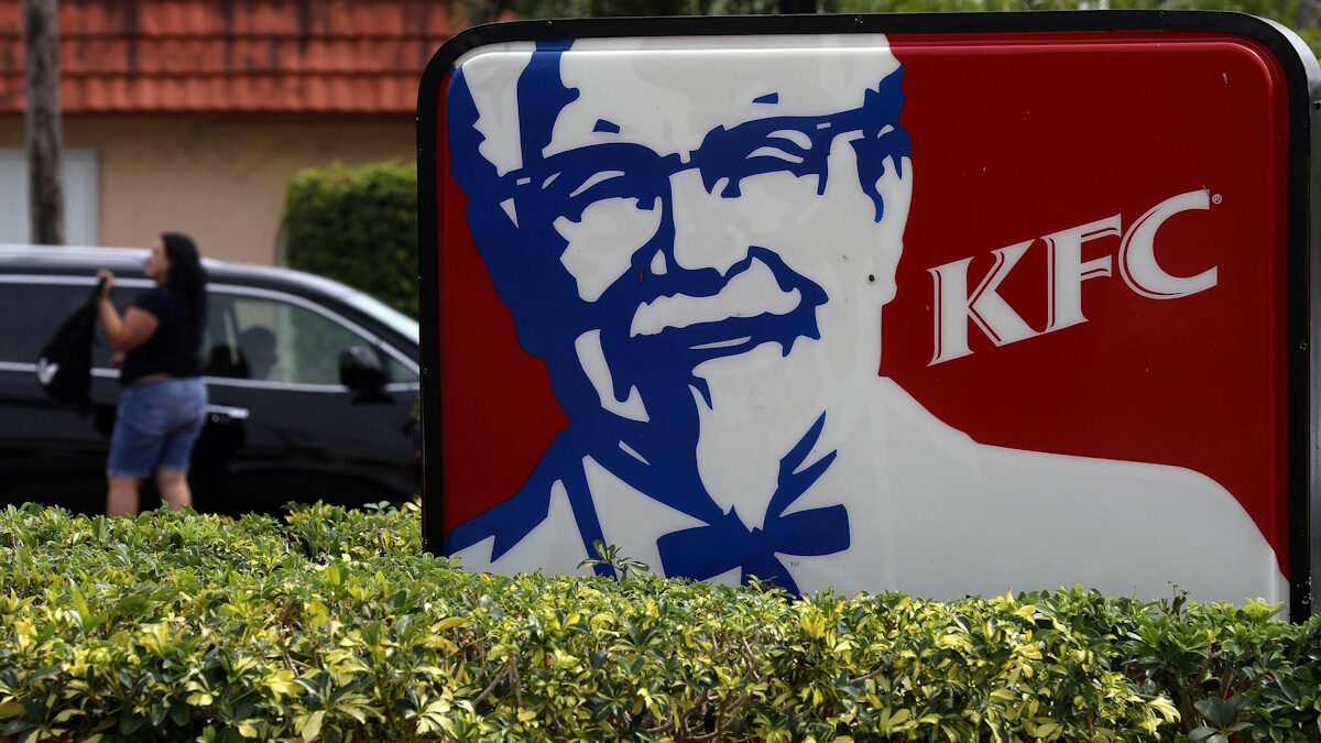 FILE PHOTO: A Kentucky Fried Chicken (KFC) logo is pictured on a sign in North Miami Beach, Florida, U.S. April 6, 2017