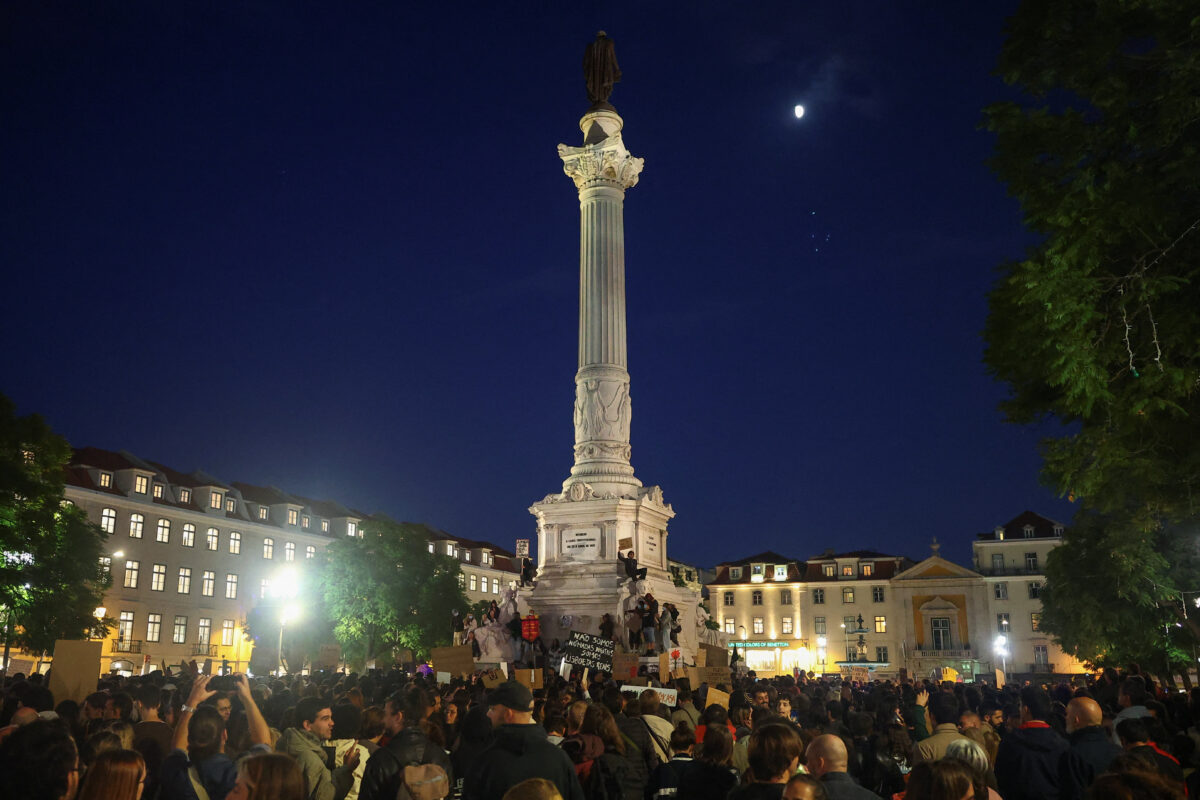 People gather to protest in Rossio Square against the housing crisis and cost of living, in Lisbon, Portugal, October 20, 2026. REUTERS