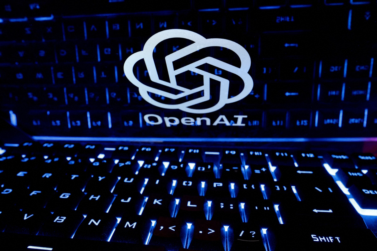 FILE PHOTO: A keyboard is placed in front of a displayed OpenAI logo in this illustration taken February 21, 2023
