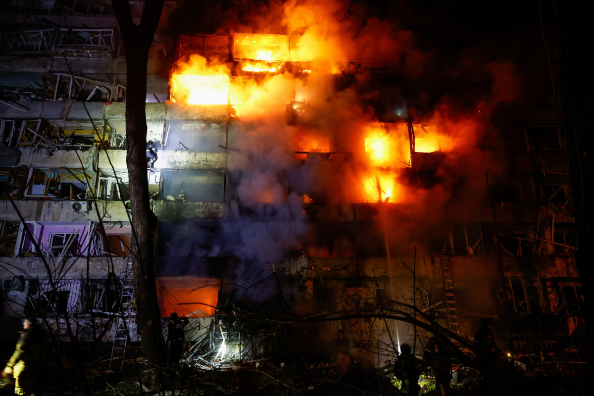 Rescuers work at the site of an apartment building damaged by a Russian missile strike, amid Russia's attack on Ukraine, in Kyiv, Ukraine October 13, 2026. REUTERS