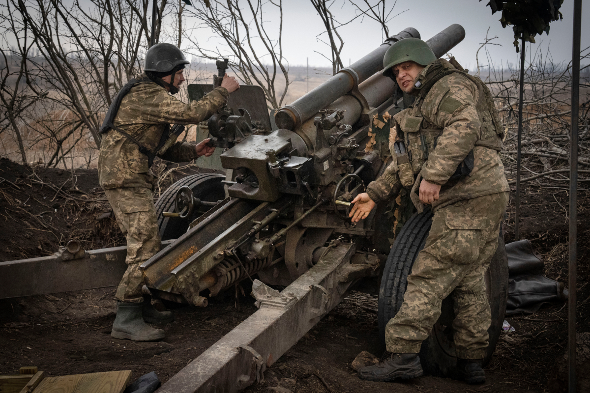 FILE - Ukrainian soldiers of the 71st Jaeger Brigade fire a M101 howitzer towards Russian positions at the frontline, near Avdiivka, Donetsk region, Ukraine, Friday, March 22, 2024. Much of what NATO can do for Ukraine, and indeed for global security, is misunderstood. Often in the public mind, the alliance is thought of as the sum of all U.S. relations with its European partners, from imposing sanctions and other costs on Russia to sending arms and ammunition. But as an organization its brief is limited to the defense by military means of its 32 member countries and a commitment to help keep the peace in Europe and North America.