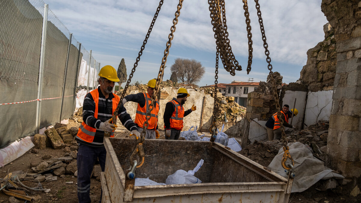 Workers clear rubble and salvage stones from the ruins of St. Paul's Greek Orthodox Church, damaged in the 2023 earthquake, in the city of Antakya, southern Turkey, Wednesday, Feb. 4, 2026.