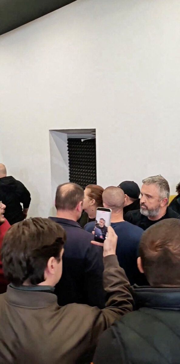 Protestors confront editor of Informer TV, Dragan Vucicevic, in media's Belgrade office, Serbia, October 26, 2026 in this screengrab obtained from a social media video published on TikTok @veljars