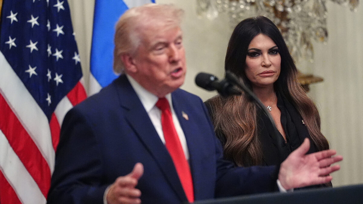 President Donald Trump speaks at a reception celebrating Greek Independence Day, in the East Room of the White House, Thursday, March 26, 2026, in Washington, as U.S. Ambassador to Greece Kimberly Guilfoyle, listens.