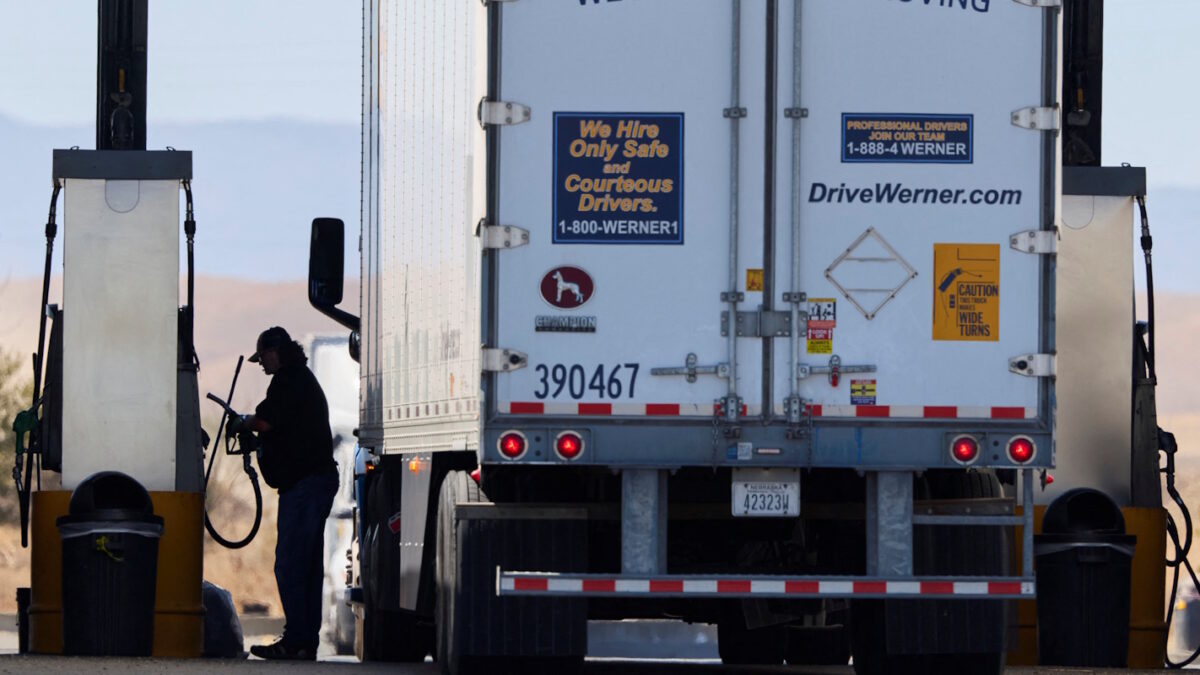 A driver operates the diesel pump at a truck stop in Dunnigan, California, U.S., September 28, 2026.
