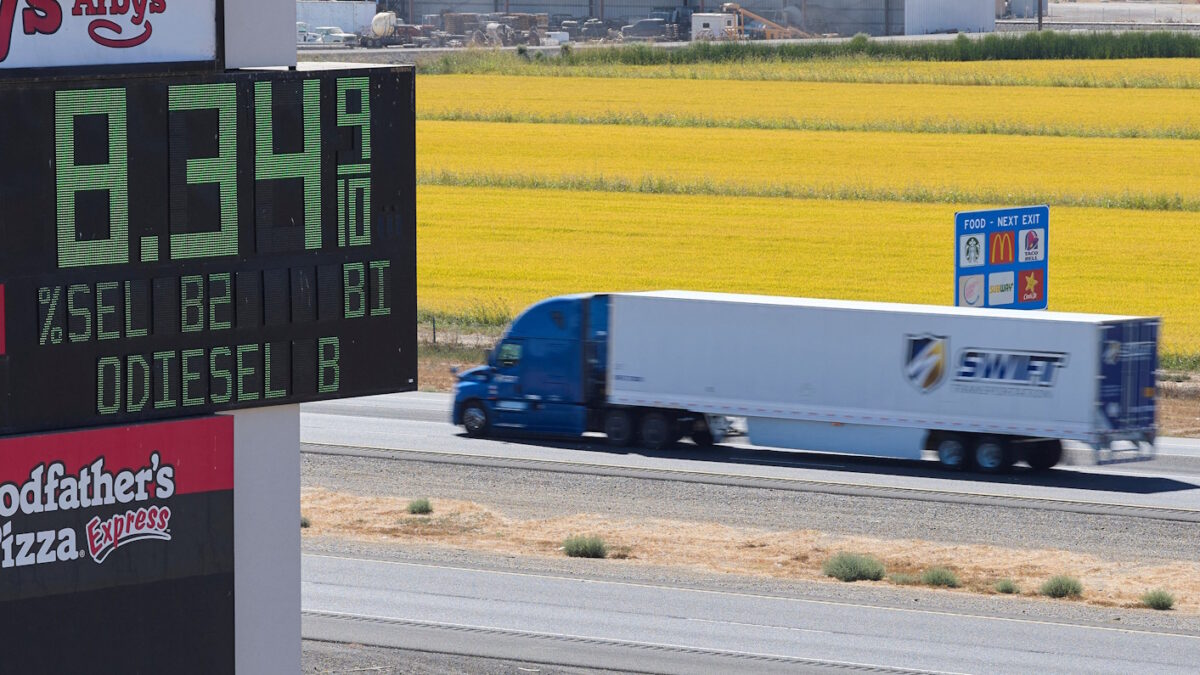 A semi drives past a sign advertising the price of diesel along Interstate 5 in Williams, California, U.S., September 28, 2026.